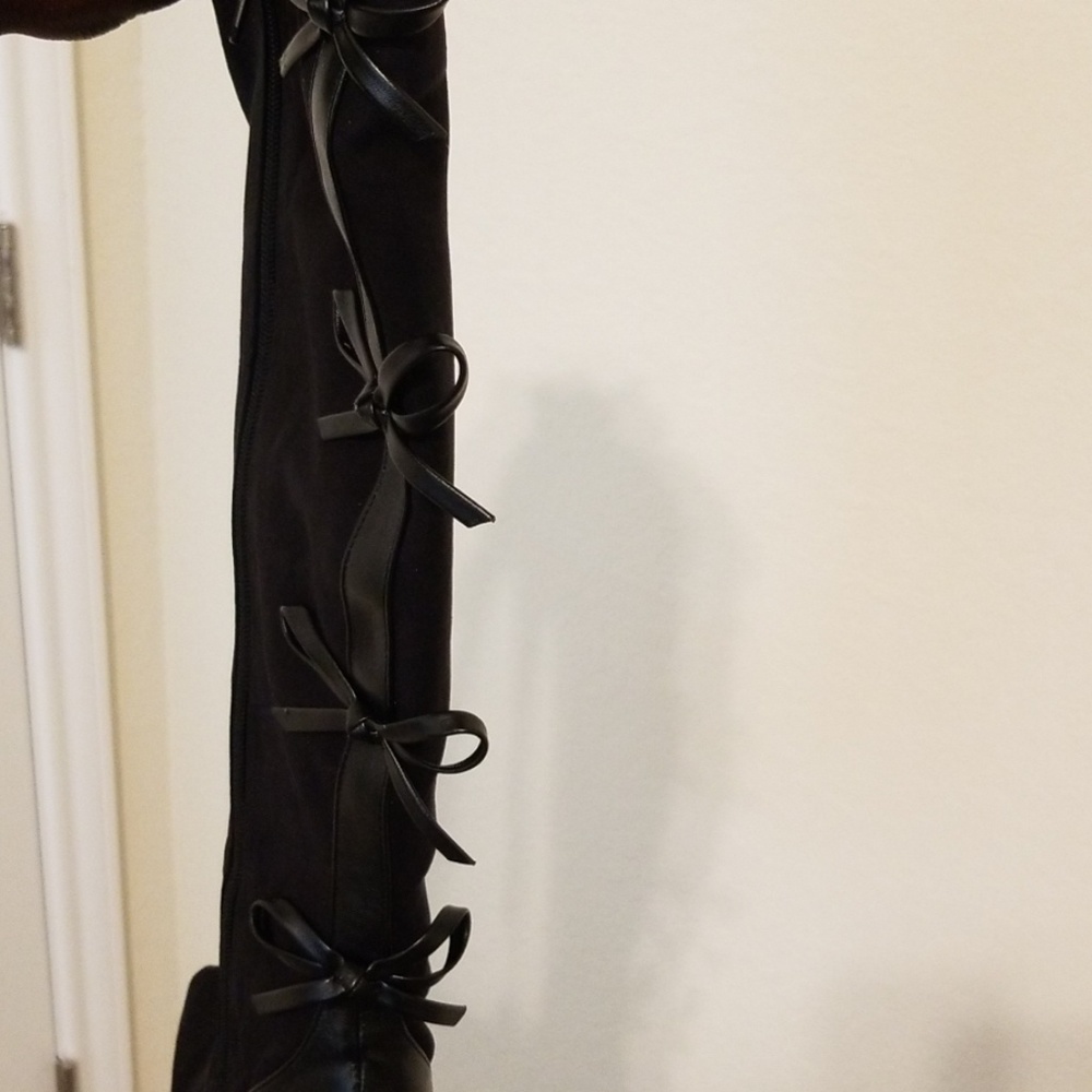 Black suede and leather bowtie boots